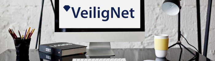 Banner van VeiligNet op computer